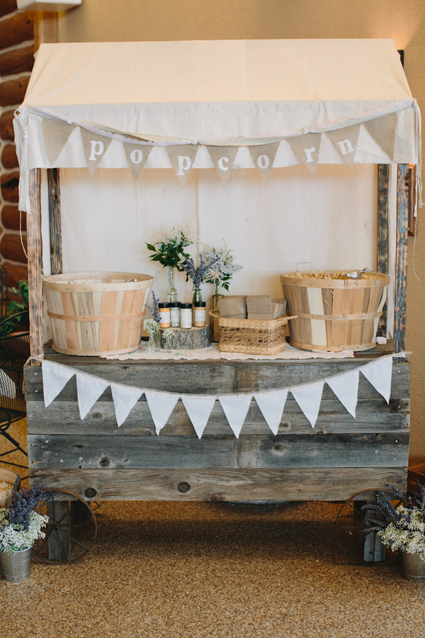 Popcorn table decoration with rustic vintage inspiration - wedding photo by Michigan-based wedding photographers Bryan and Mae